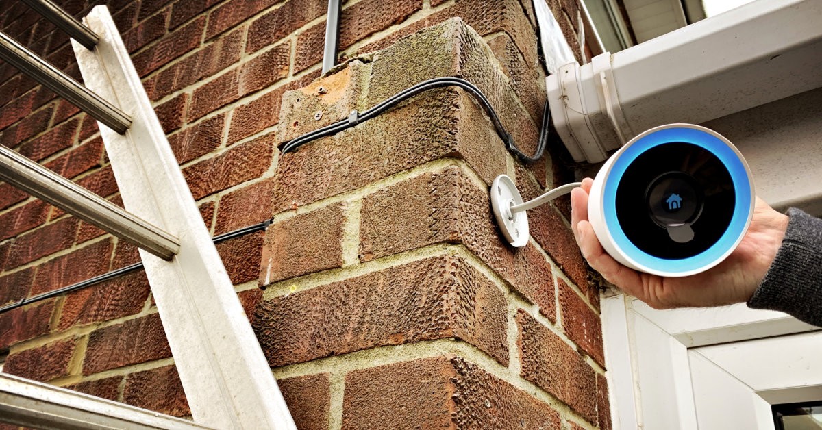 Set up of security camera on brick wall